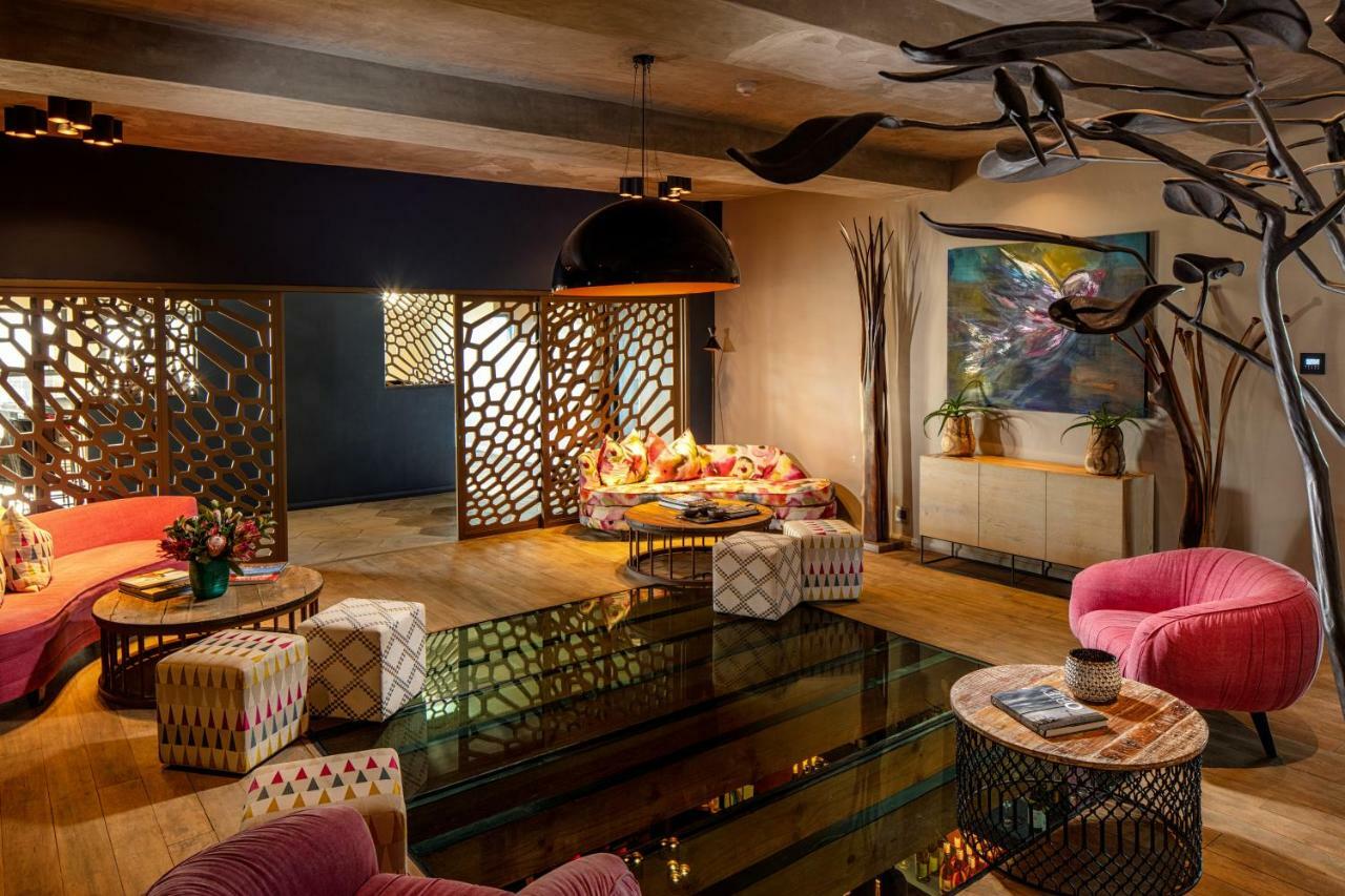 Sky Villa Boutique Hotel By Raw Africa Collection Plettenberg Bay Bagian luar foto The interior of the restaurant